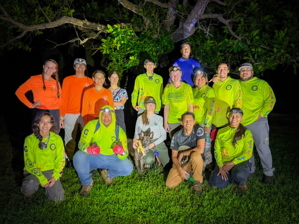 The G3CC take a group photo with members of the National Park Service at Asan Beach Park.
