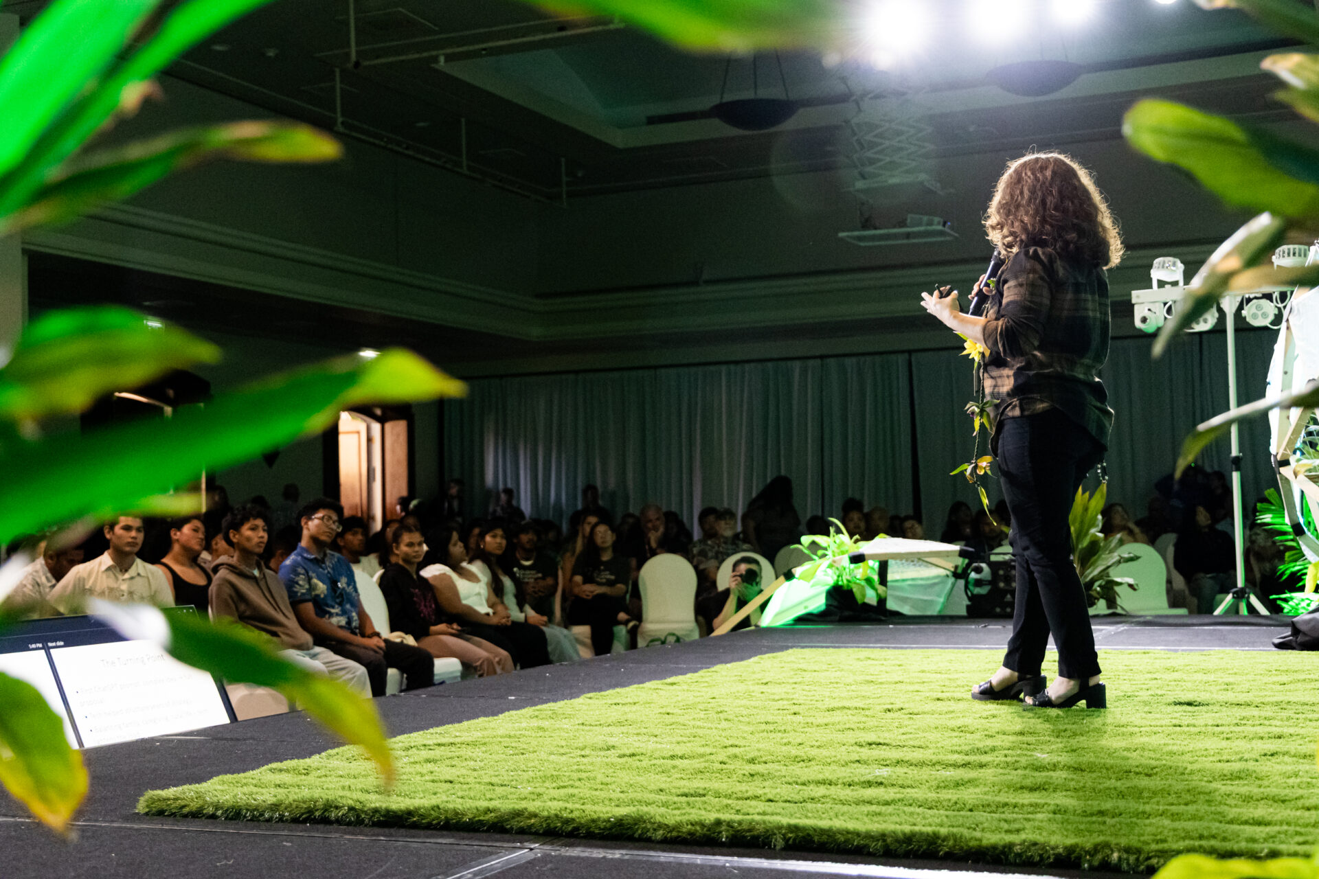 A speaker at CIS2025's Seed Talks addressing a crowd.