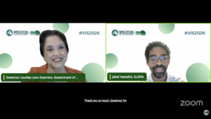 a split-screen video capture of a Zoom meeting during the 2026 Virtual Island Summit, featuring Governor Lourdes Leon Guerrero speaking on the left and Jabal Hassalini from GLISPA on the right.