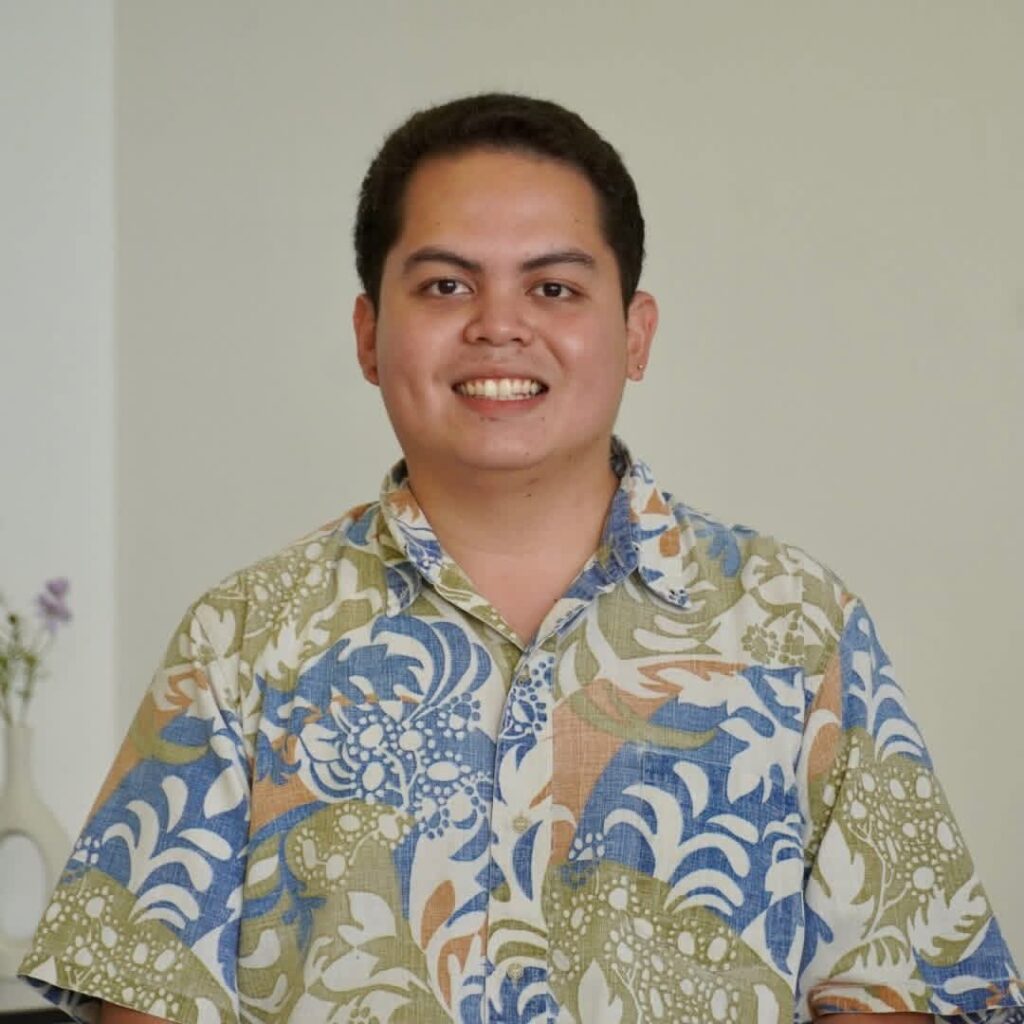 Headshot photo of Thomas Manglona