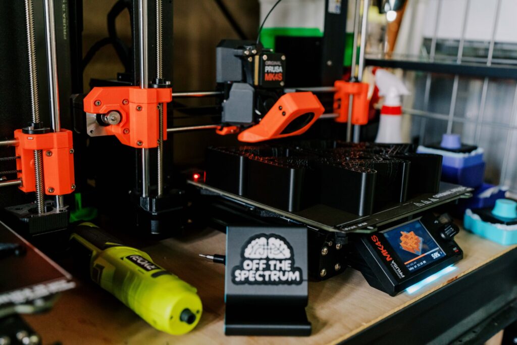 phone stand designed by Shawn Garcia for participants of "Walk Different" event